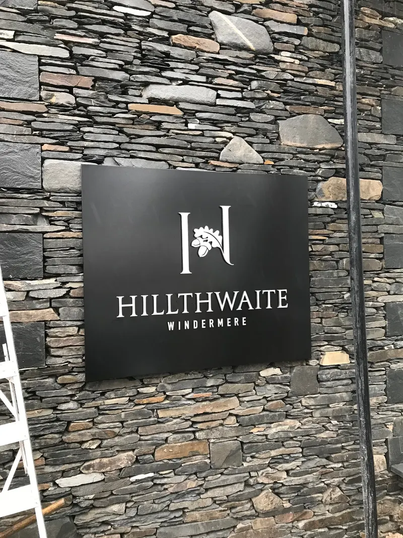 Hillthwaite Windermere entrance sign on slate wall